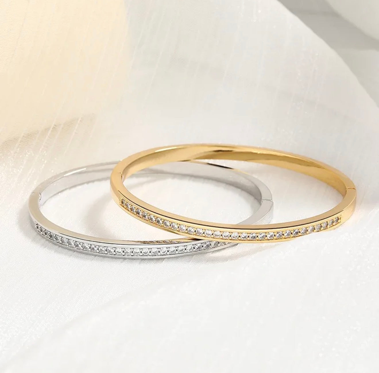 Luxe Whisper • Crystal trim gold bangle | soft flex, big light