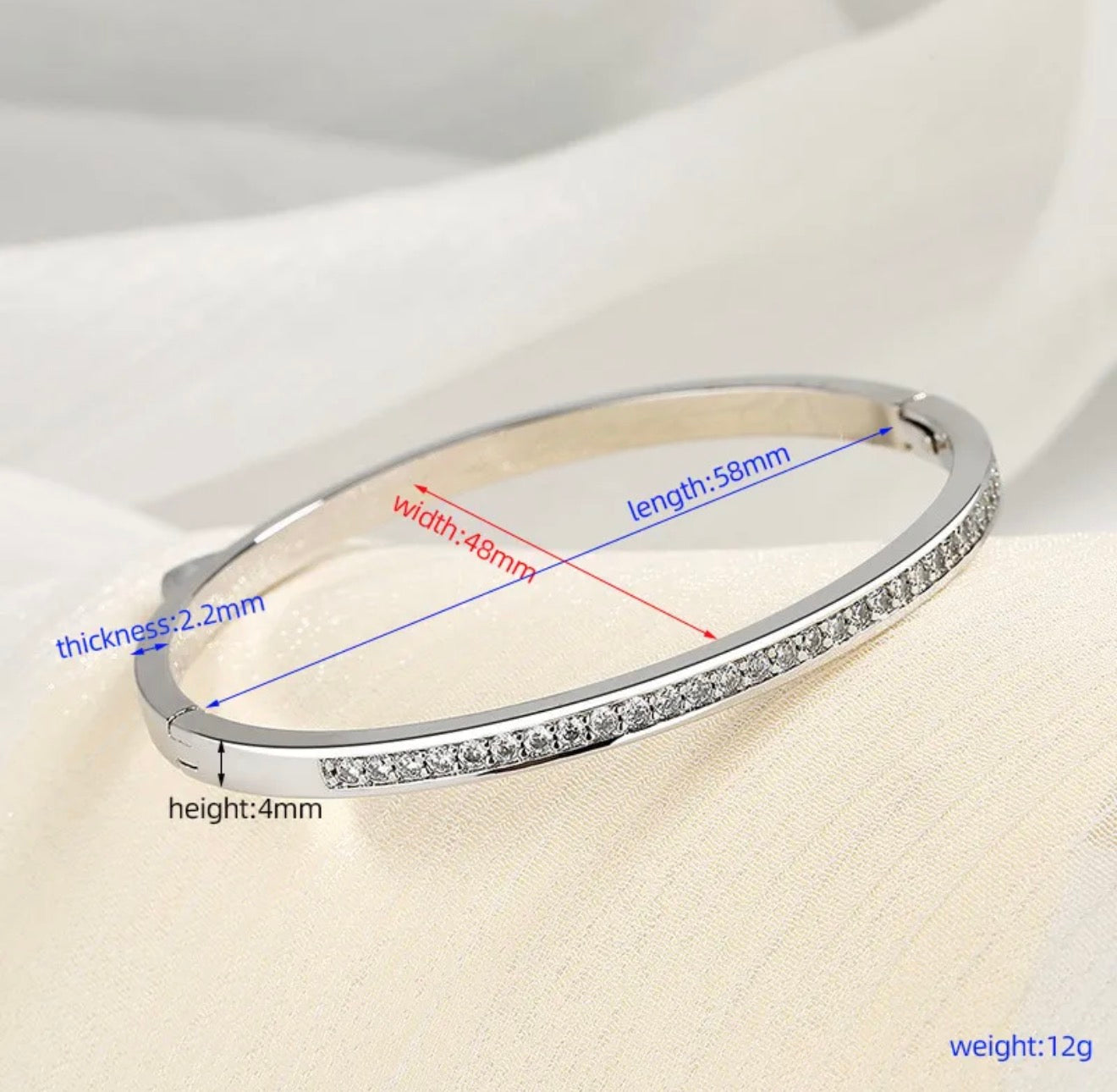 Luxe Whisper • Crystal trim gold bangle | soft flex, big light